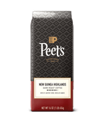 Peet's coffee New Guinea Highlands bag with a black and red design on a green background